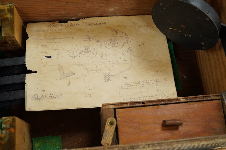 An Air Ministry First World War cased tank inspection lamp, 78cm long, together with a cased Air Ministry Interception Calculator, plywood case; 71cm wide, 24cm deep, 24cm high. Condition poor to fair.